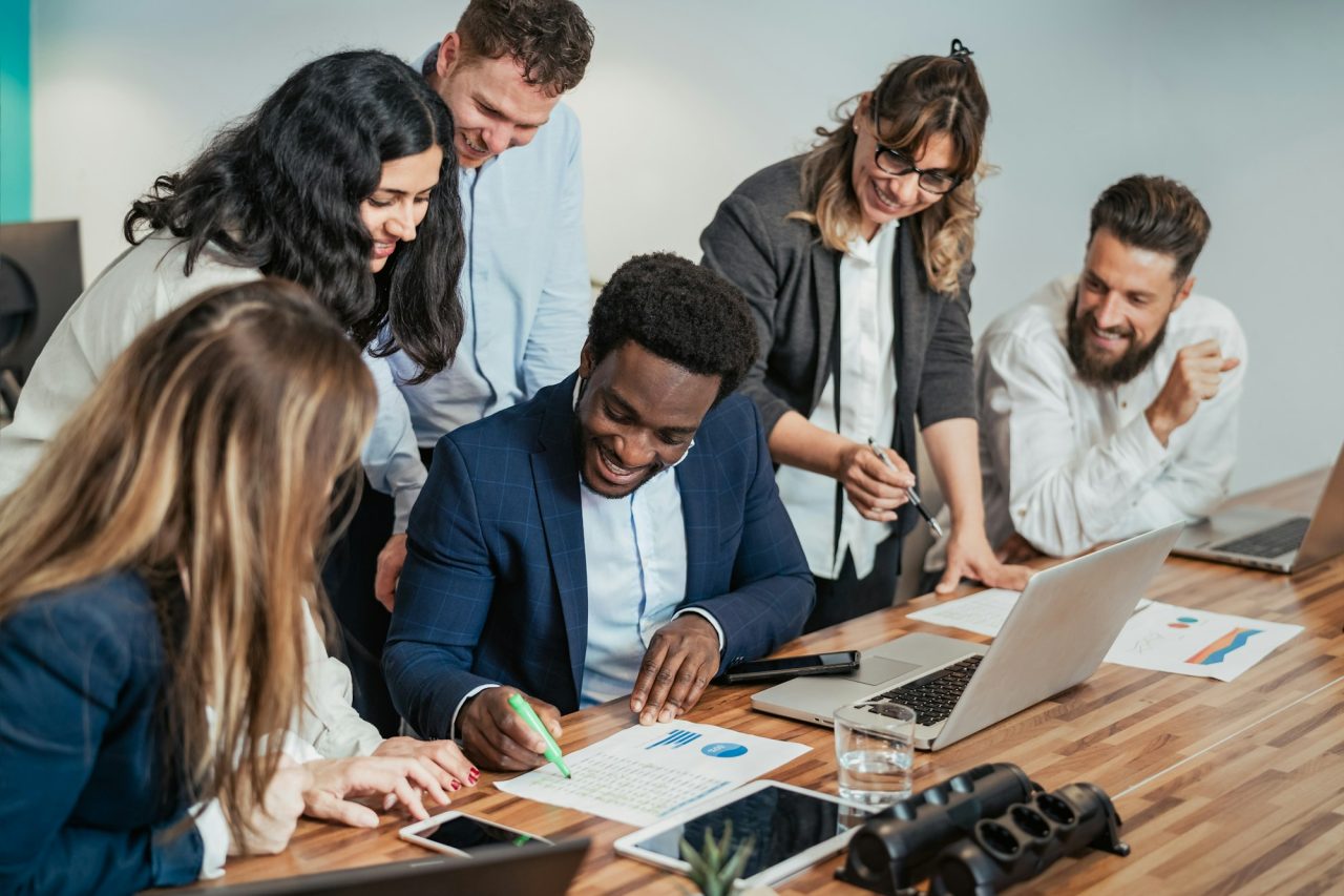 business-team-of-diverse-people-doing-strategic-planning-work-inside-modern-office.jpg